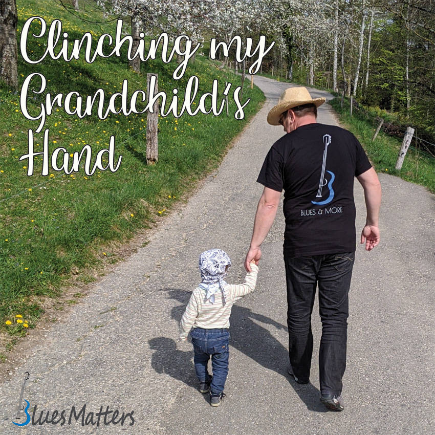 Clinching my grandchilds hand